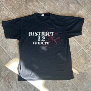 Vintage The Hunger Games District 12 Tribute T-Shirt